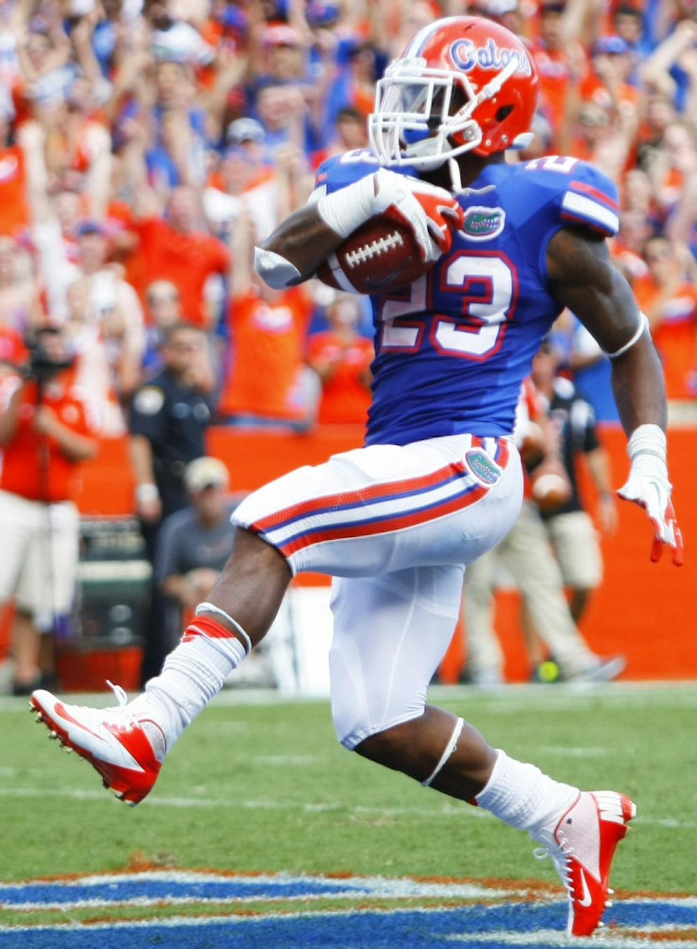 <p>Senior running back Mike Gillislee (23) runs in a touchdown against Bowling Green at Ben Hill Griffin Stadium on Sept. 1. Gillislee, a native of DeLand, Fla., worked up the Florida depth chart his first three years to now lead the Southeastern Conference in rushing as the Gators' premier running back.</p>