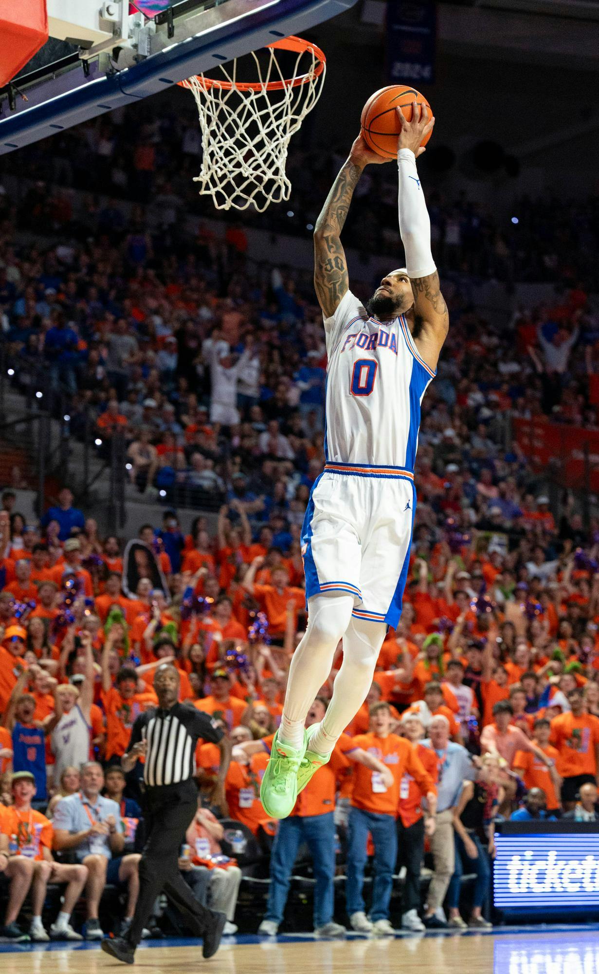 Florida guard Boogie Fland (0) dunks during the first half of an NCAA college basketball game against Kentucky, Saturday, Feb. 14, 2026 at Exactech Arena in Gainesville, Fla.
