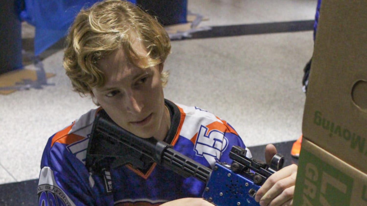 Timothy De Marcken, a 20-year-old UF mechanical engineering sophomore, attends the laser tag event at the Physics Building hosted by the Astronomy and Astrophysics Society, along with the Society of Physics Students, on Friday. The purpose of the event was to raise money for a conference this November.