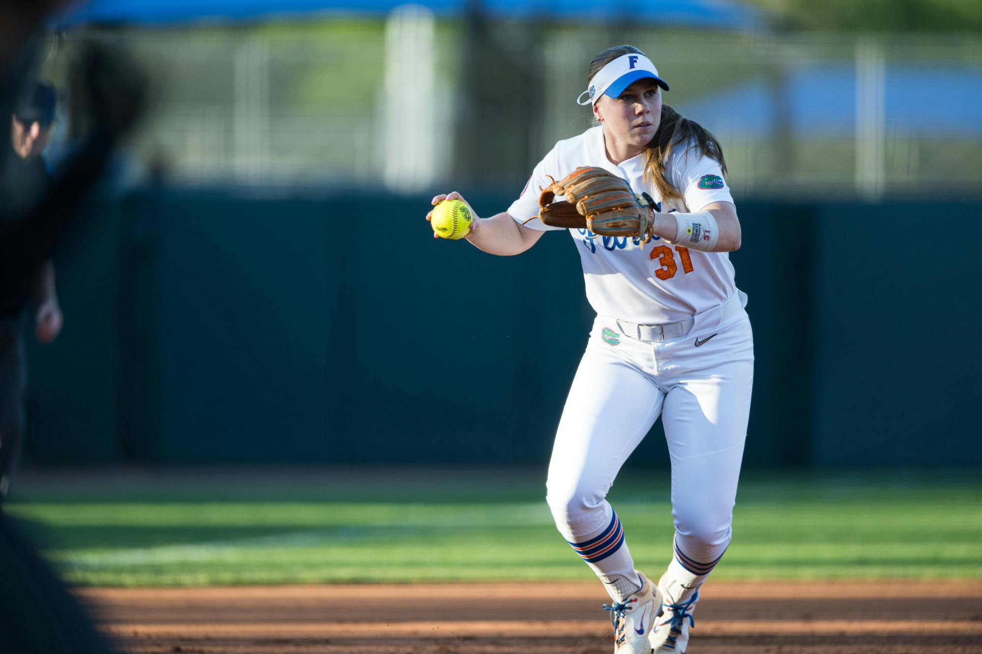 Florida Gators infielder Kenleigh Cahalan (31) throws the ball in a softball game against UCF in Gainesville, Fla., on Wednesday, March 12, 2025.