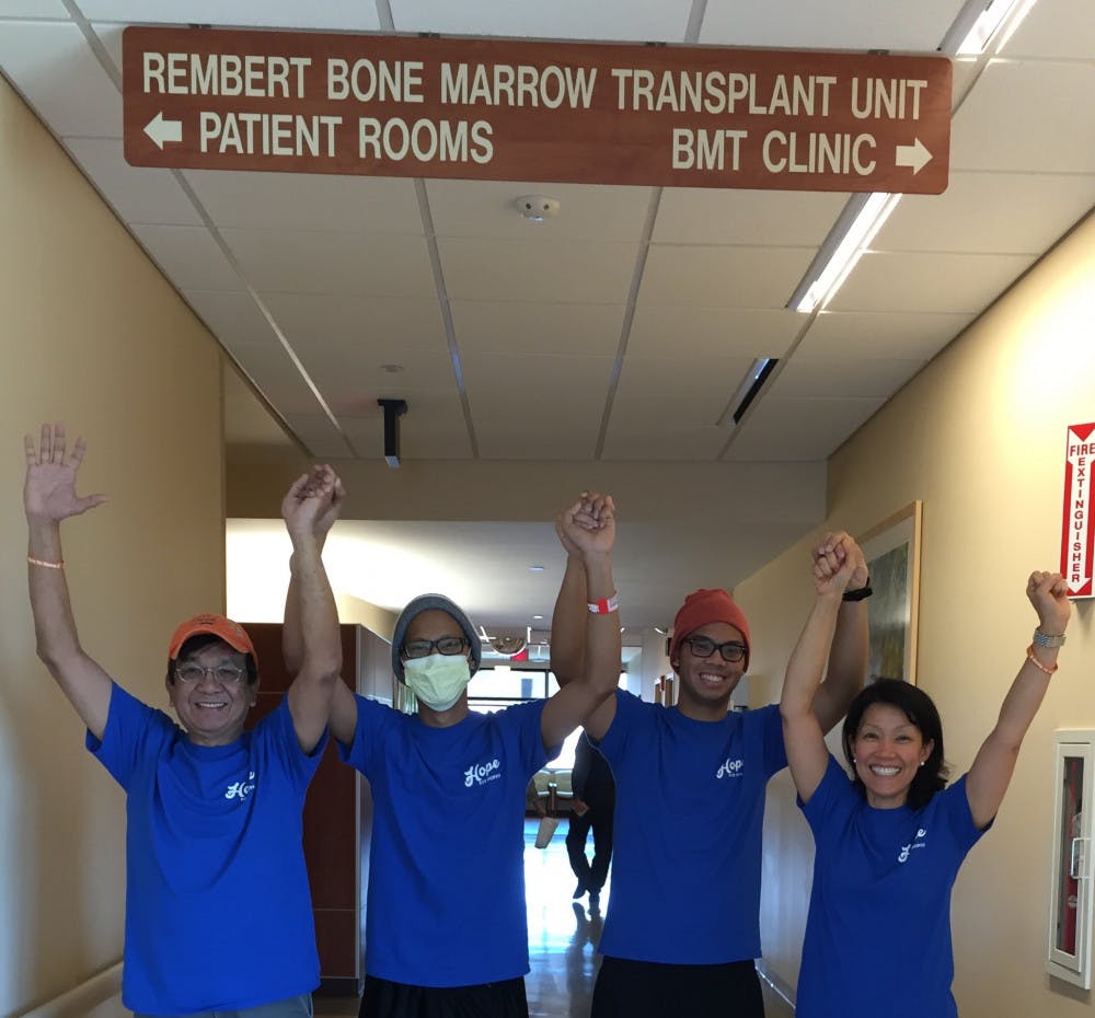 Chris Abeleda, second from left, poses with his father, brother and mother. The 21-year-old UF psychology junior was released from the hospital on Tuesday after being admitted for a bone marrow transplant to treat his Acute Lymphoblastic Leukemia.