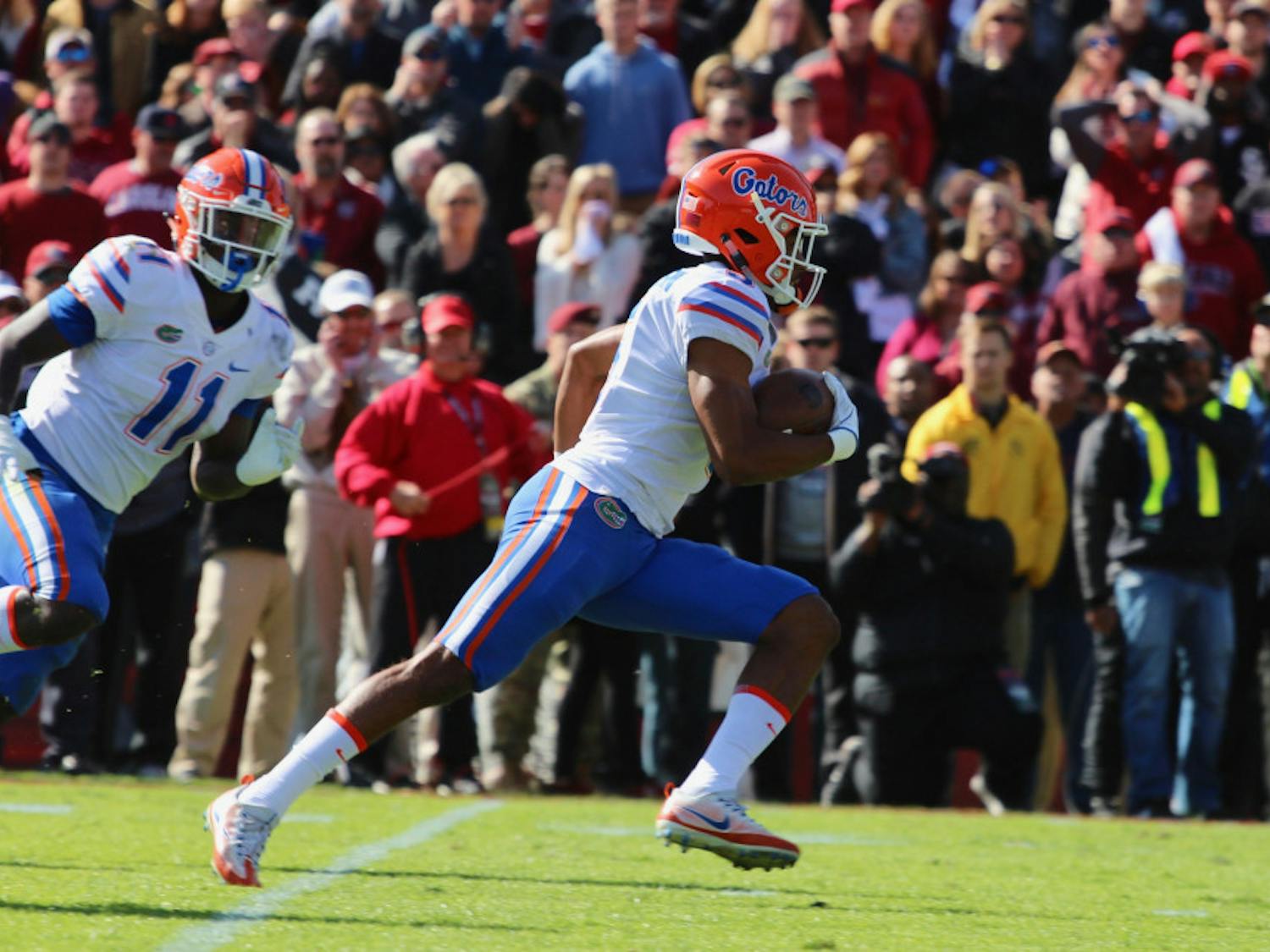 Cornerback CJ Henderson (right) exited Saturday’s game against Georgia with a lower back injury. Coach Dan Mullen said the sophomore didn’t sustain any structural damage.