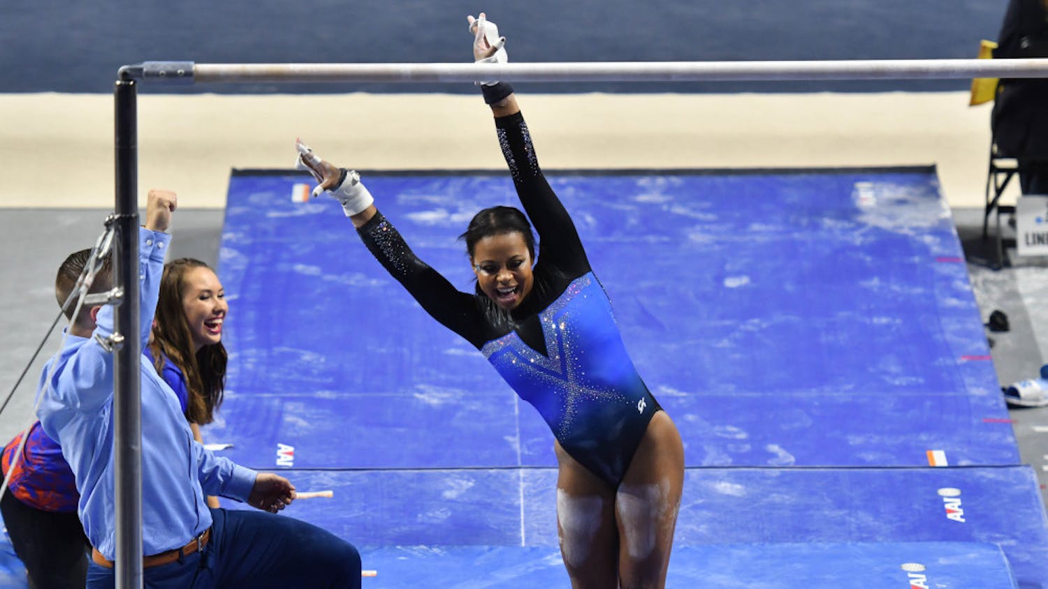 Kennedy Baker sticks the landing on her bars routine during the Gainesville NCAA gymnastics regional on April 1, 2017.