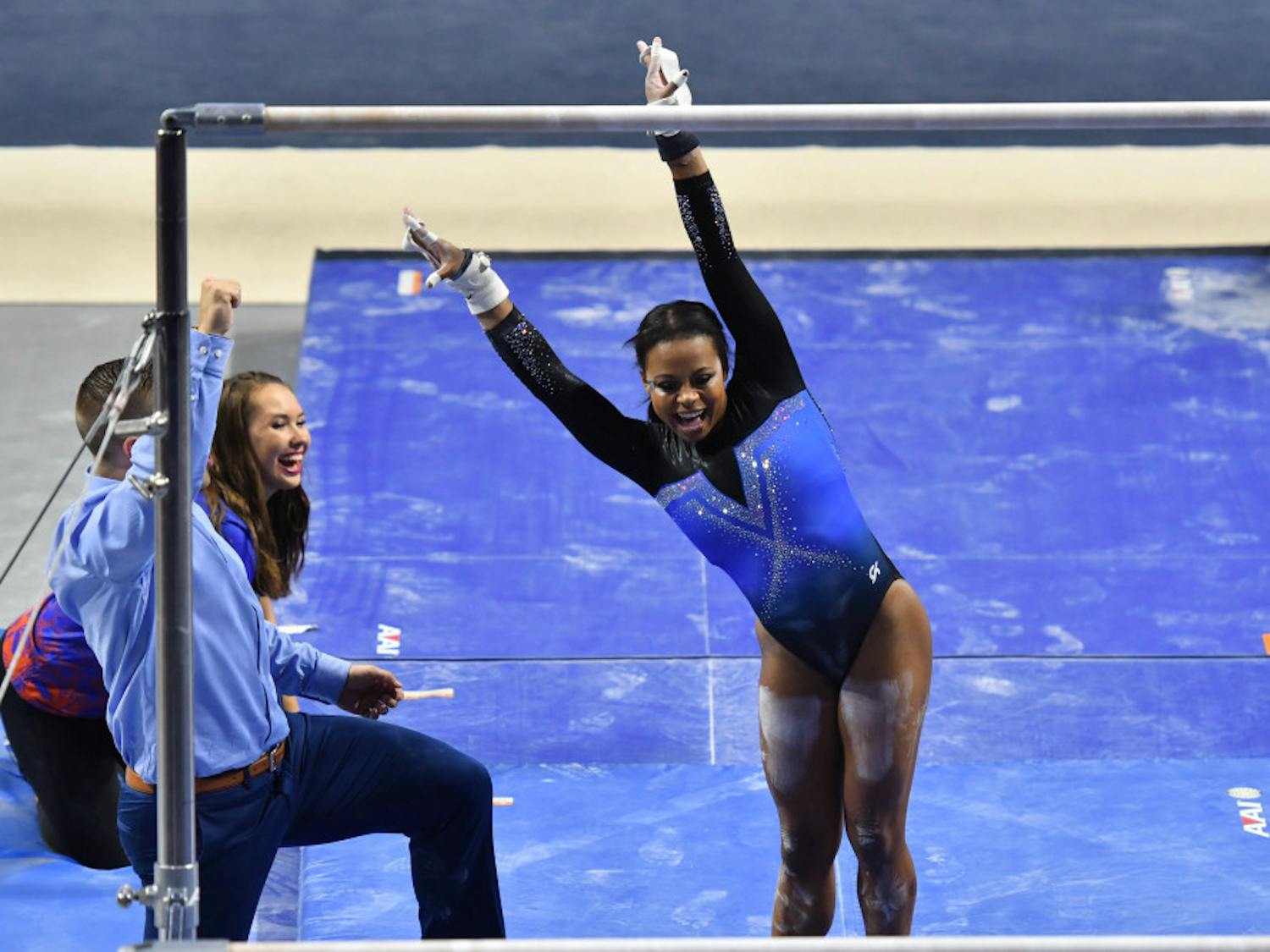 Kennedy Baker sticks the landing on her bars routine during the Gainesville NCAA gymnastics regional on April 1, 2017.