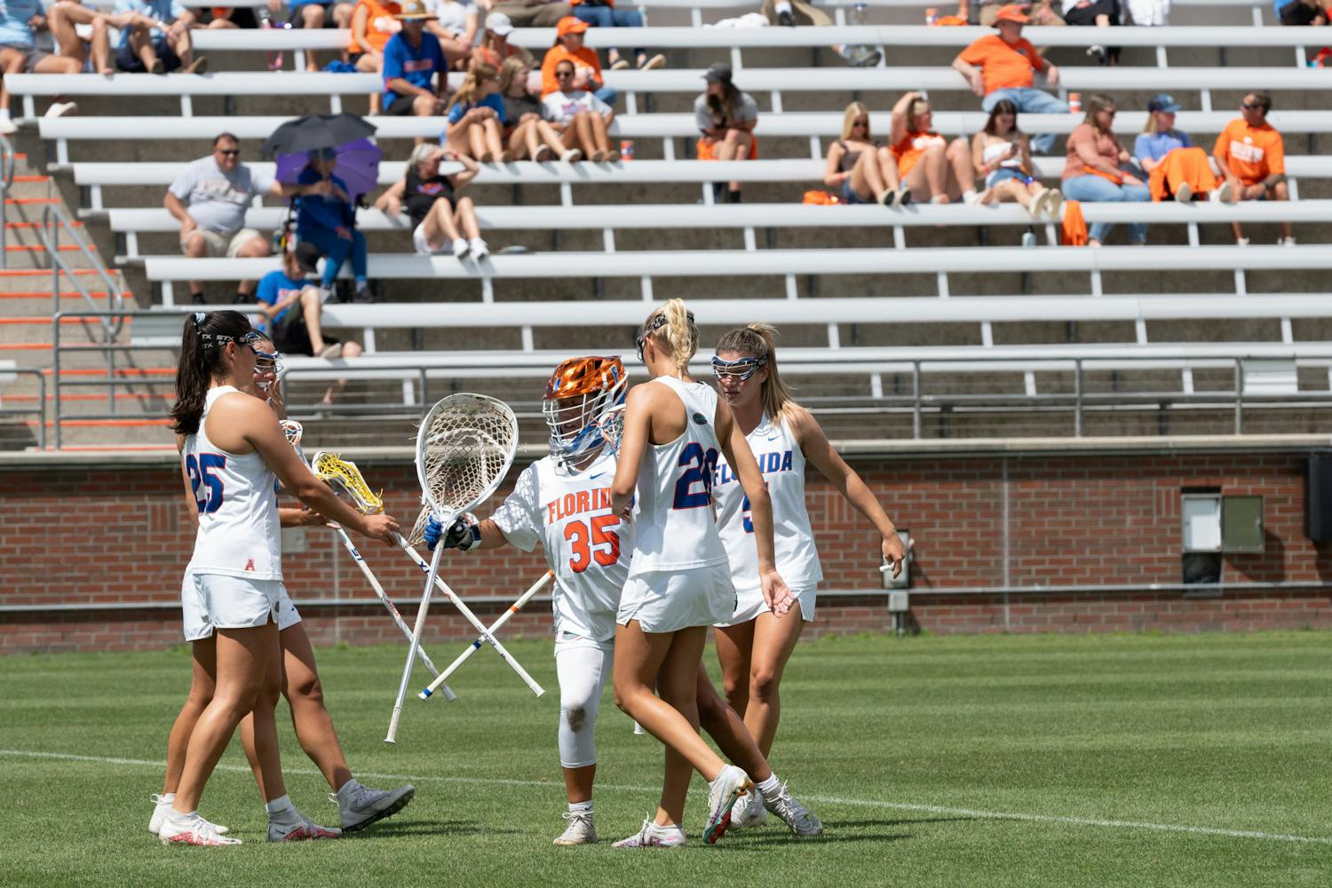 Florida lacrosse huddles up before playing a game against Old Dominion University on Saturday, March 23, 2024. 
