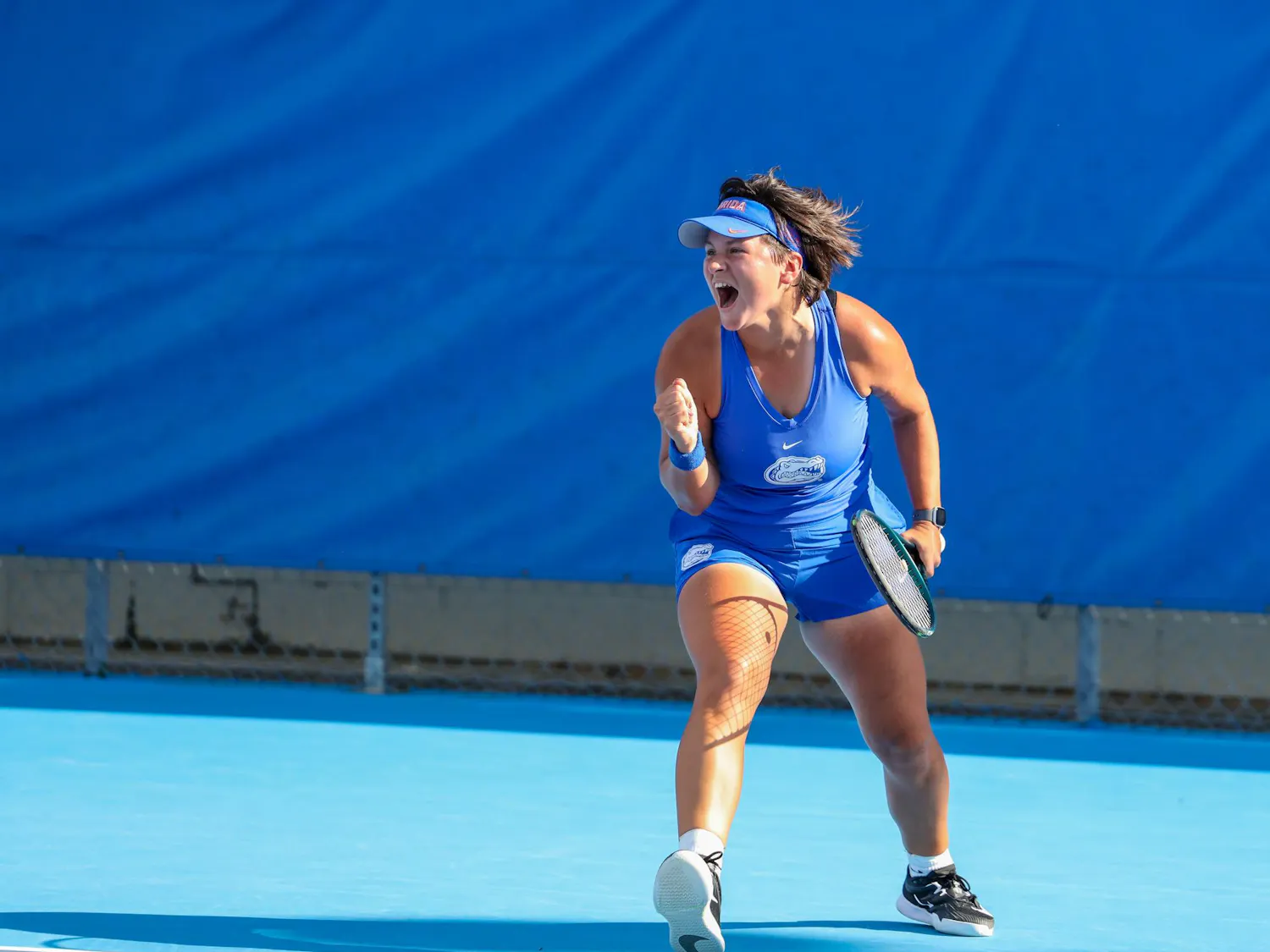 Florida’s Valery Gynina celebrates a point during an NCAA women’s doubles tennis match against Klara Milicevic and Karla Bartel of Alabama, March 26, 2026, in Gainesville, Fla.