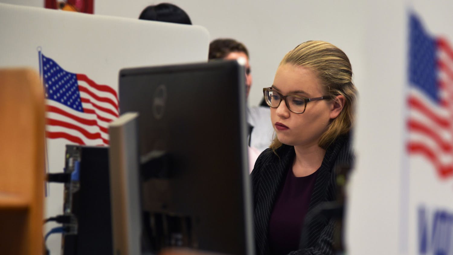 Olivia Dunbar, a 20-year-old computer engineering junior at UF, votes Tuesday in the fall student government election at the Marston Library.