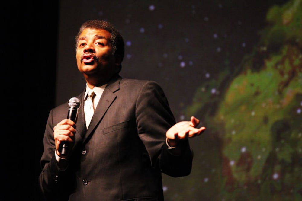 <p>Astrophysicist Neil deGrasse Tyson talks about space and science before a full house at the Phillips Center for the Performing Arts on Wednesday night.</p>