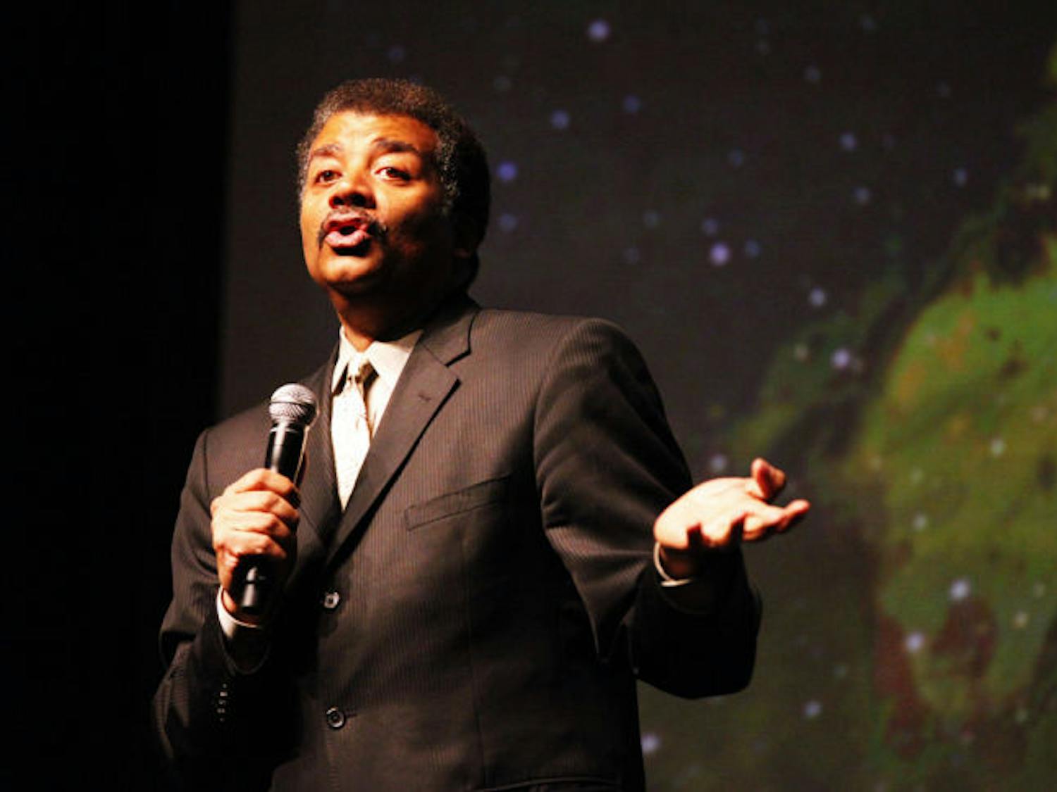 Astrophysicist Neil deGrasse Tyson talks about space and science before a full house at the Phillips Center for the Performing Arts on Wednesday night.
