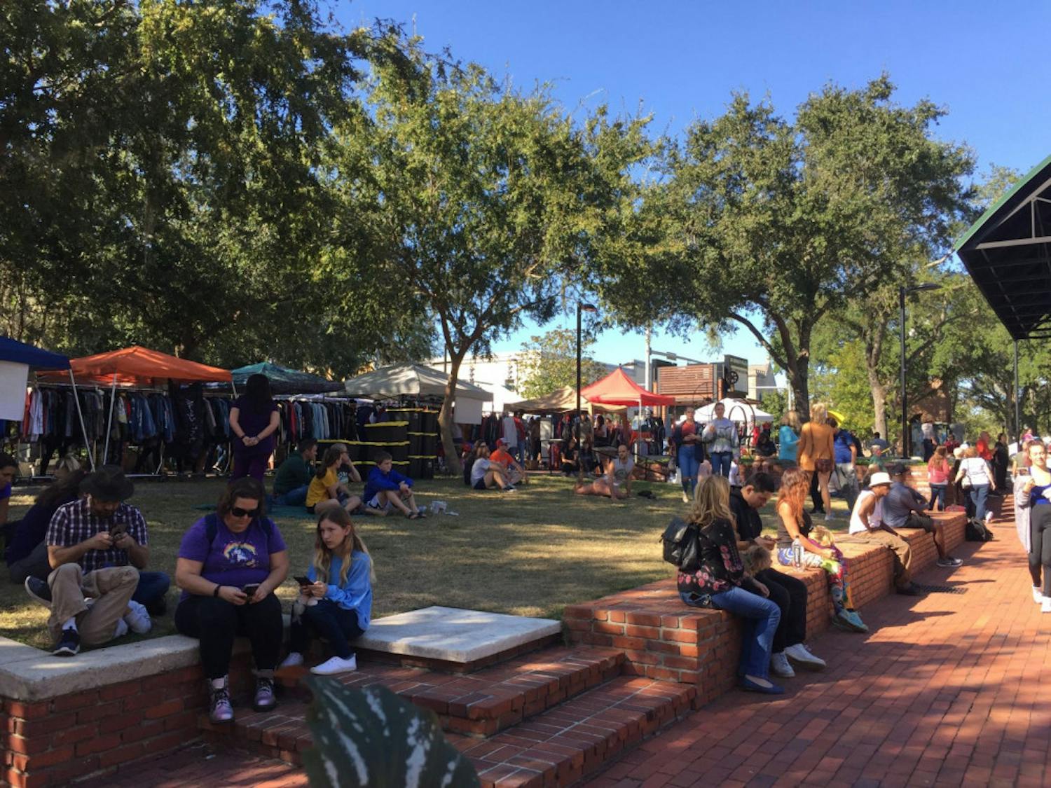 Gainesville community members visit the Florida Vintage Market at Bo Diddley Plaza on Nov. 10.