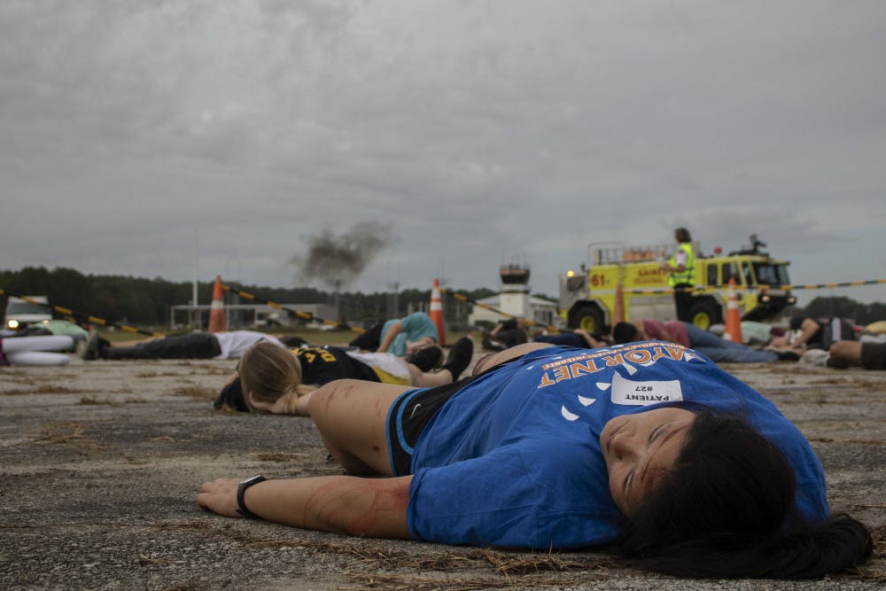 <p>About 60 students from Santa Fe College Emergency Medical Services programs volunteered to act as victims and had mock injuries applied before the event started, Porter said. Once emergency responders arrived, the actors were bandaged and placed in ambulances to simulate being driven to the hospital.</p>
