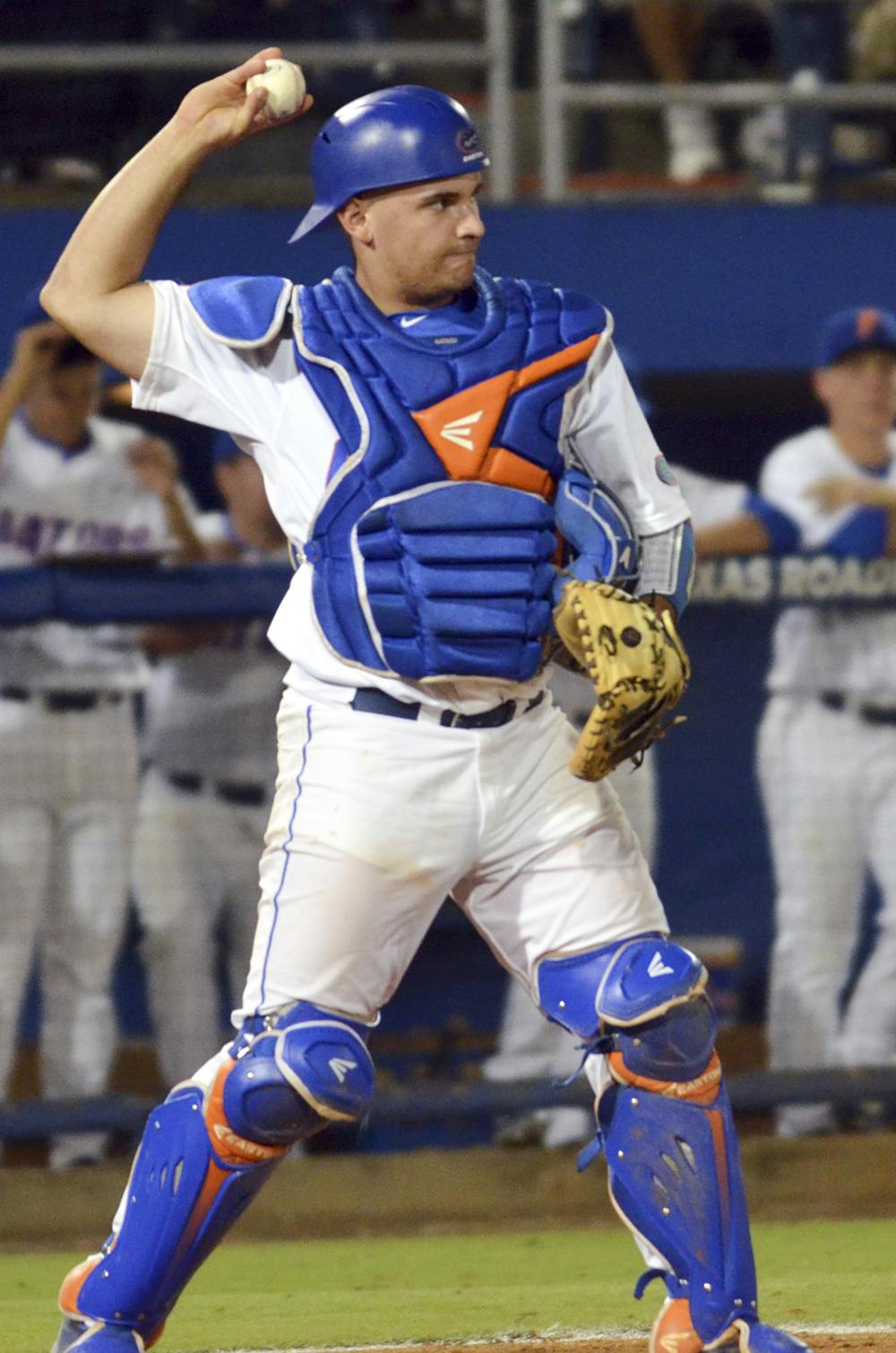 <p>UF freshman catcher Mike Rivera throws the ball back to pitcher Logan Shore (not pictured) during Florida's 14-3 win against South Carolina on April 10, 2015 at McKethan Stadium.</p>