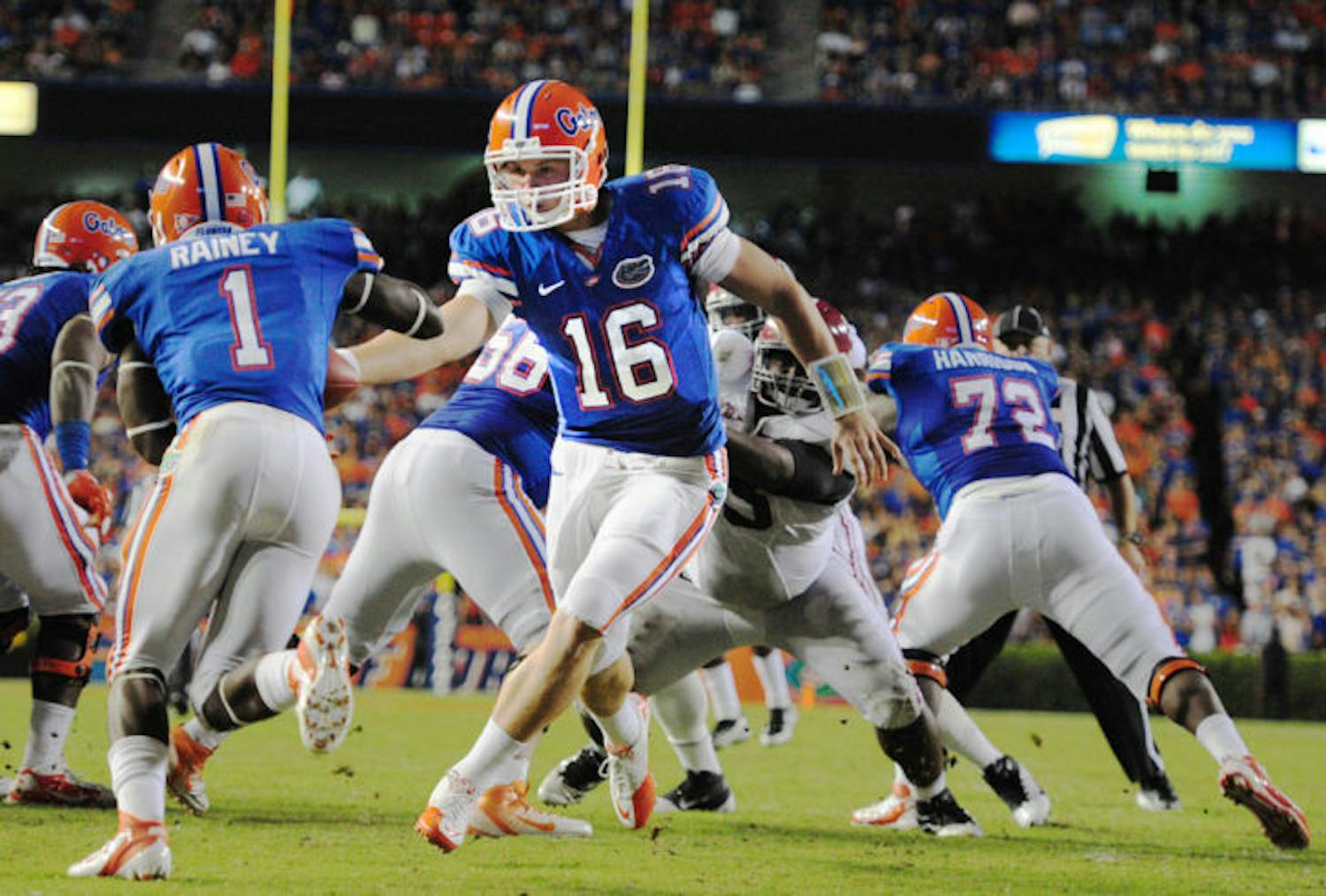 Quarterback Jeff Driskel hands off the ball to running back Chris Rainey during Florida’s 38-10 loss to Alabama in Ben Hill Griffin Stadium on Oct. 1, 2011.