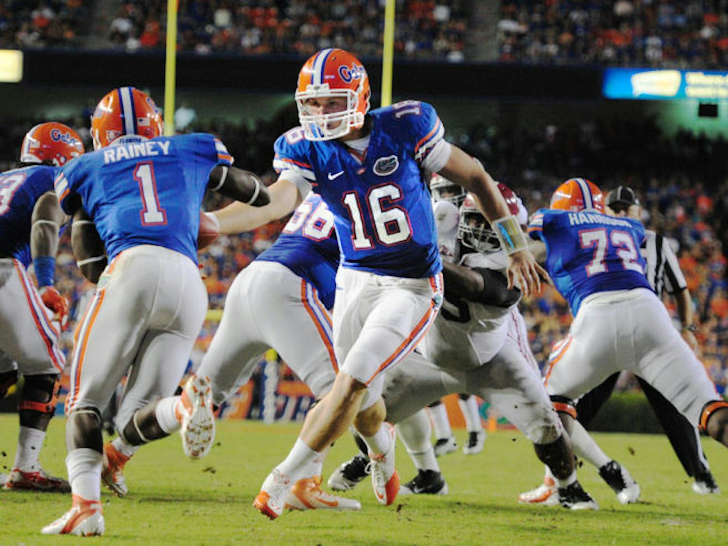 Quarterback Jeff Driskel hands off the ball to running back Chris Rainey during Florida’s 38-10 loss to Alabama in Ben Hill Griffin Stadium on Oct. 1, 2011.