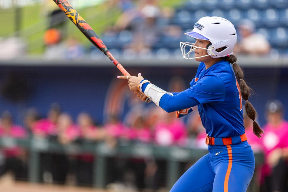 Florida Gators infielder Gabi Comia (10) swings during the game against the UCF Knights on Sunday, Oct. 19, 2025.