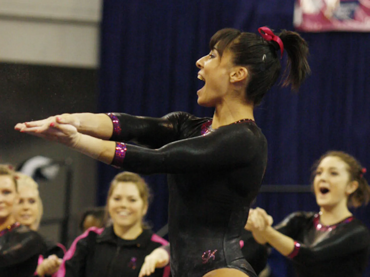 Gymnast Marissa King does a Gator Chomp during Florida’s 197.65-196.025 win against Auburn on Jan. 25 in the O’Connell Center.