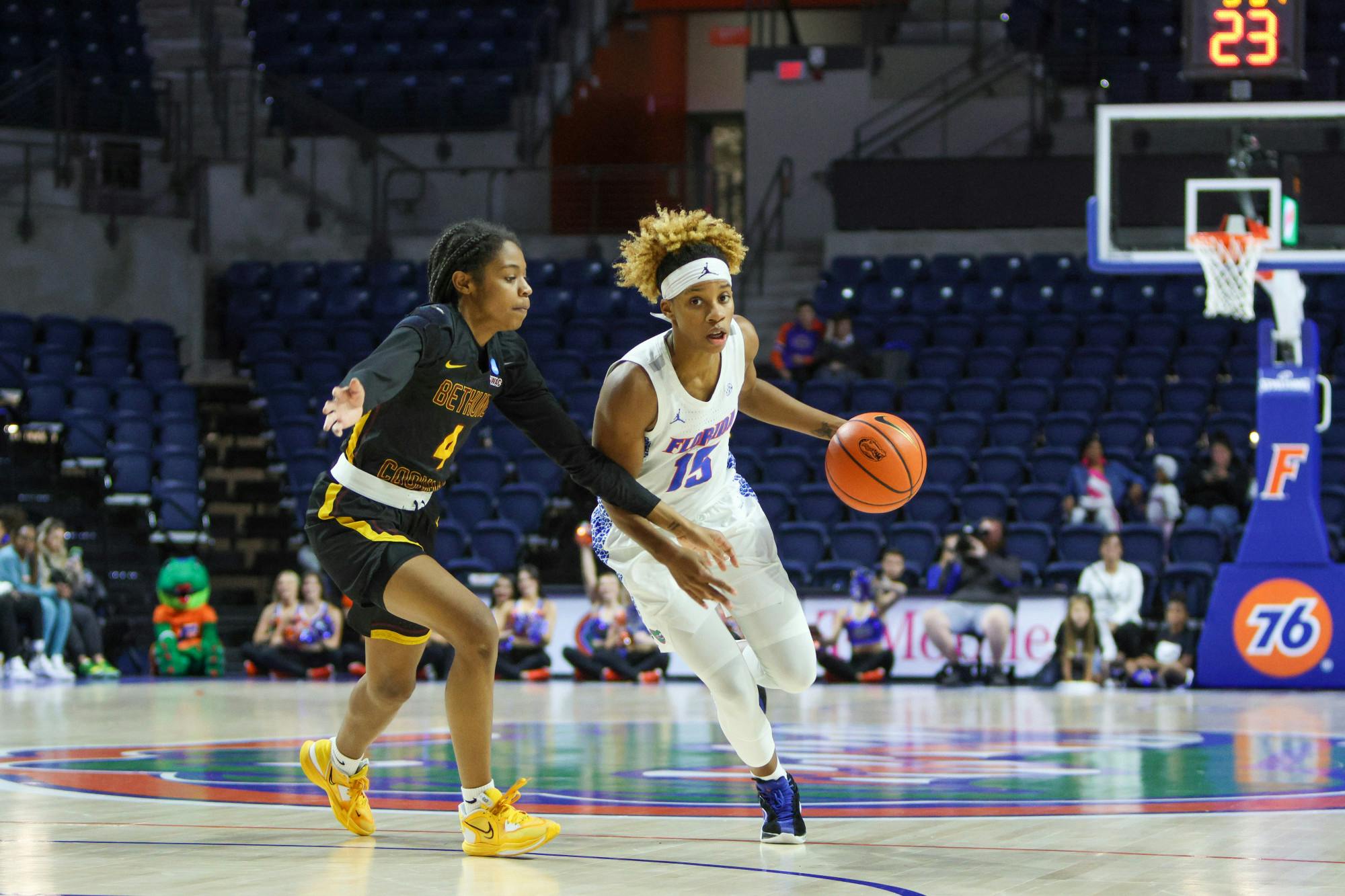 Senior guard Nina Rickards, who scored a career high 23 points, drives past Bethune-Cookman guard Morgan Beacham Friday, Nov. 18, 2022. 