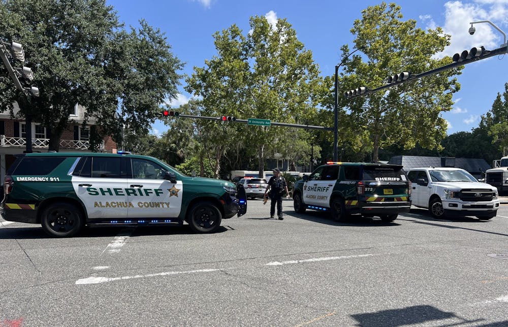 Alachua County Sheriff's Office deputies blocked West University Avenue after responding to an armed suspect on Tuesday, July 29, 2025. 