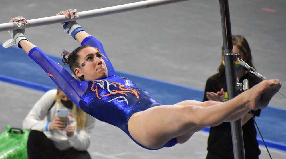 Leah Clapper on the bars during the UF-Missouri meet Jan. 29.