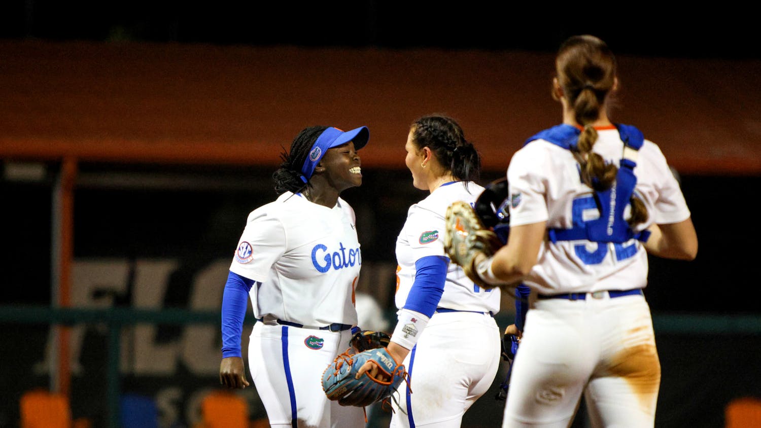 Florida third baseman Charla Echols celebrates with her teammates during the Gators' 3-0 victory against the Central Florida Knights Wednesday, March 8, 2023.