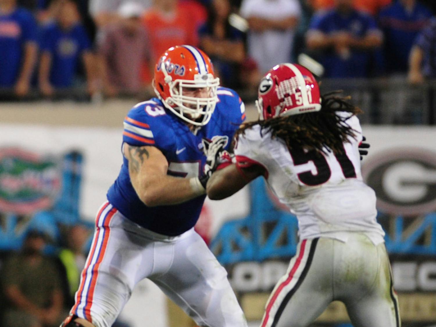 Tyler Moore (73) blocks Georgia junior inside linebacker Ramik Wilson (51) during Florida’s 23-20 loss to the Bulldogs on Saturday at EverBank Field in Jacksonville.