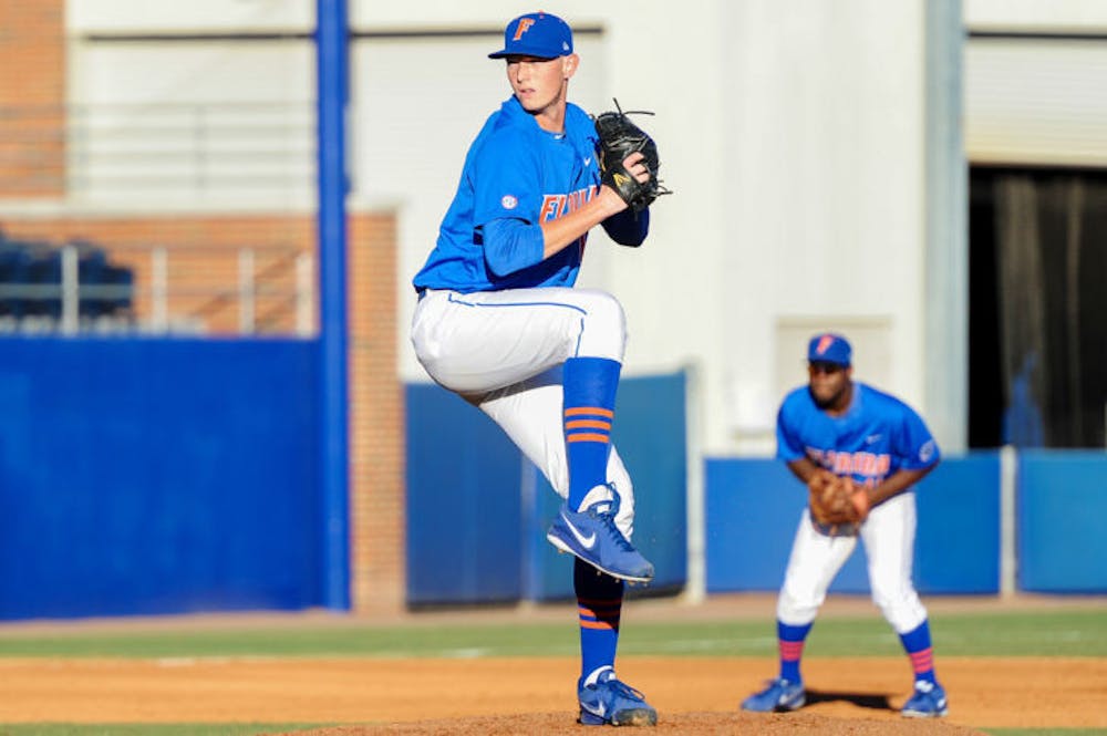 <p>A.J. Puk pitches during Florida’s 9-7 loss against Maryland on Feb. 15 at McKethan Stadium.</p>