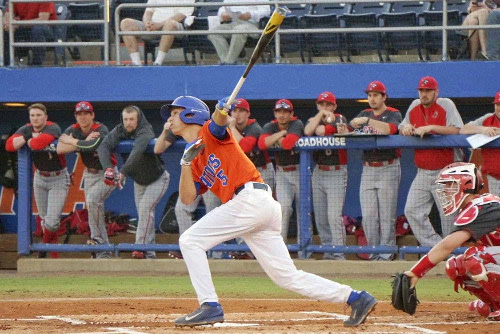 <p>Dalton Guthrie swings at a pitch during Florida's 8-7 win against Fairfield on March 10 at McKethan Stadium. Guthrie scored the go-ahead run for Florida in its 9-7 win against Vanderbilt on Saturday.&nbsp;</p>