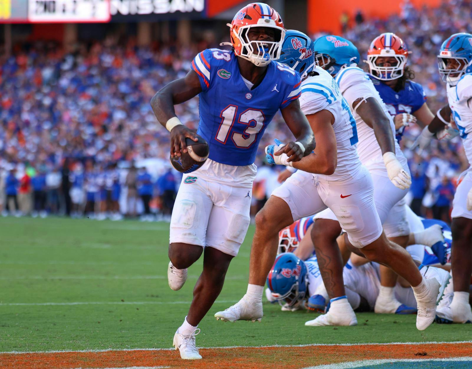 Florida running back Jadan Baugh (13) celebrates a touchdown during an NCAA college football game against Ole Miss, Saturday, Sept. 26, 2026, in Gainesville, Fla.