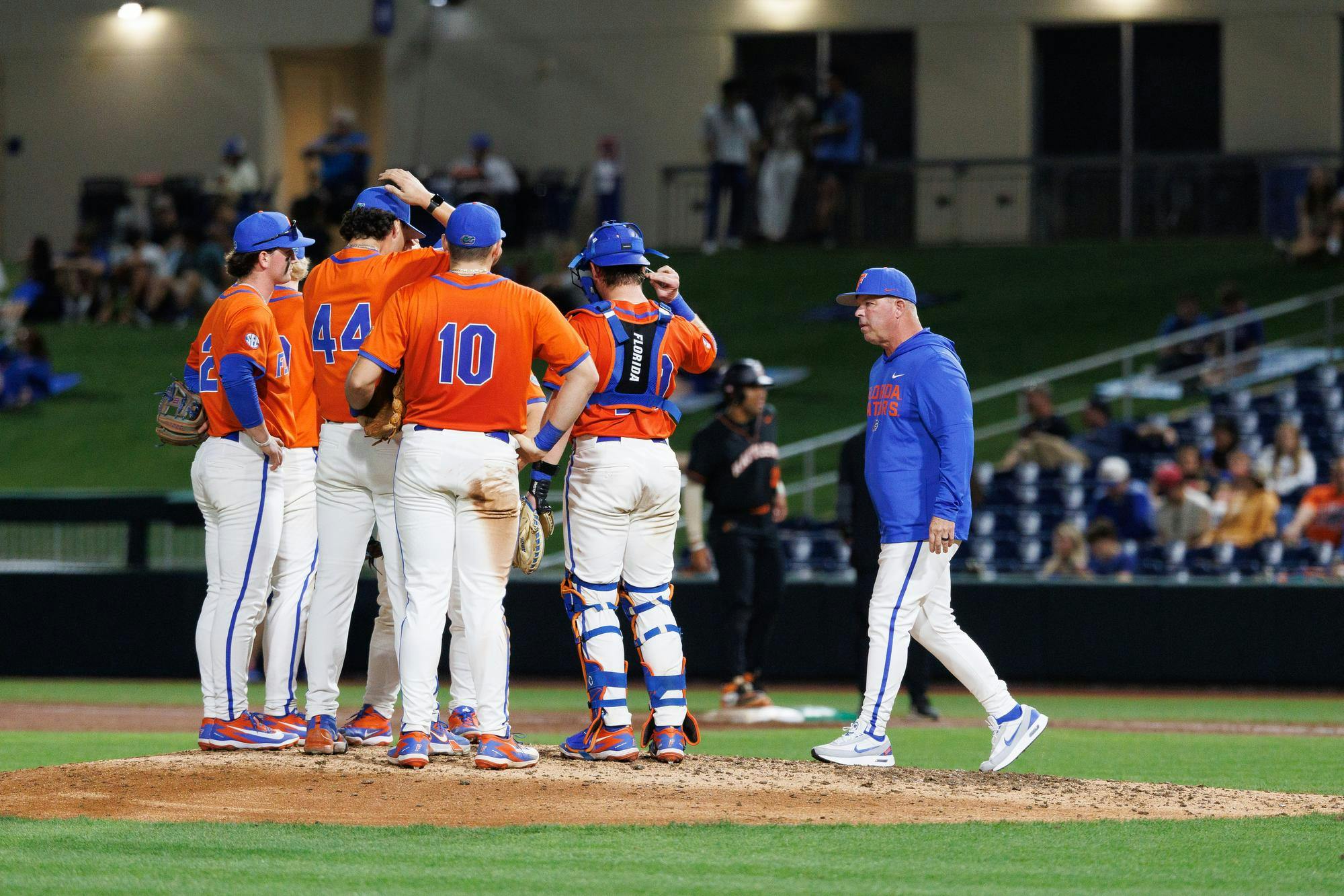Florida head coach Kevin O'Sullivan walk to the mound during a pitching change during an NCAA baseball game against Florida A&M University, Wednesday, March 4, 2026, in Gainesville, Fla.