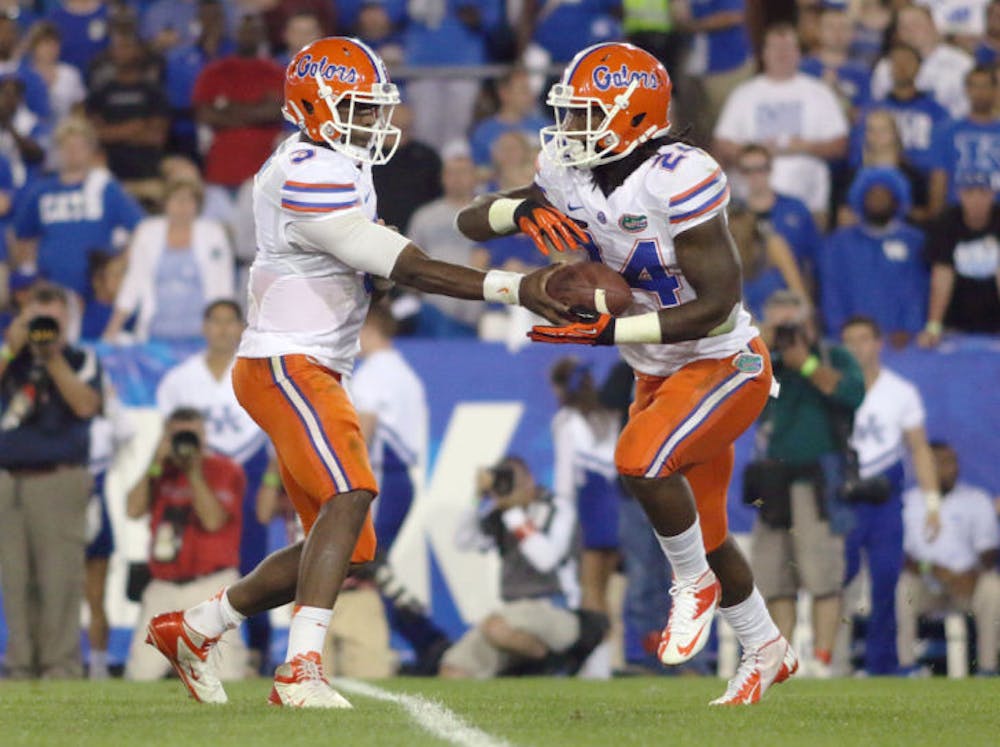 <p>Matt Jones takes a handoff during Florida’s 24-7 victory against Kentucky on Sept. 28 in Commonwealth Stadium in Lexington, Ky. Jones (torn meniscus) underwent surgery on Monday and will miss the remainder of the season.&nbsp;</p>