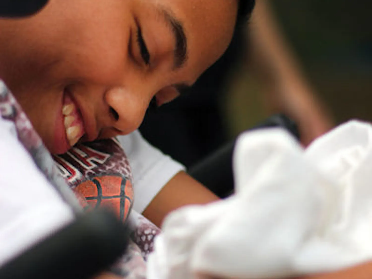 Daniel Ratovoson smiles while going for a walk with his older brother on Oct. 13.
