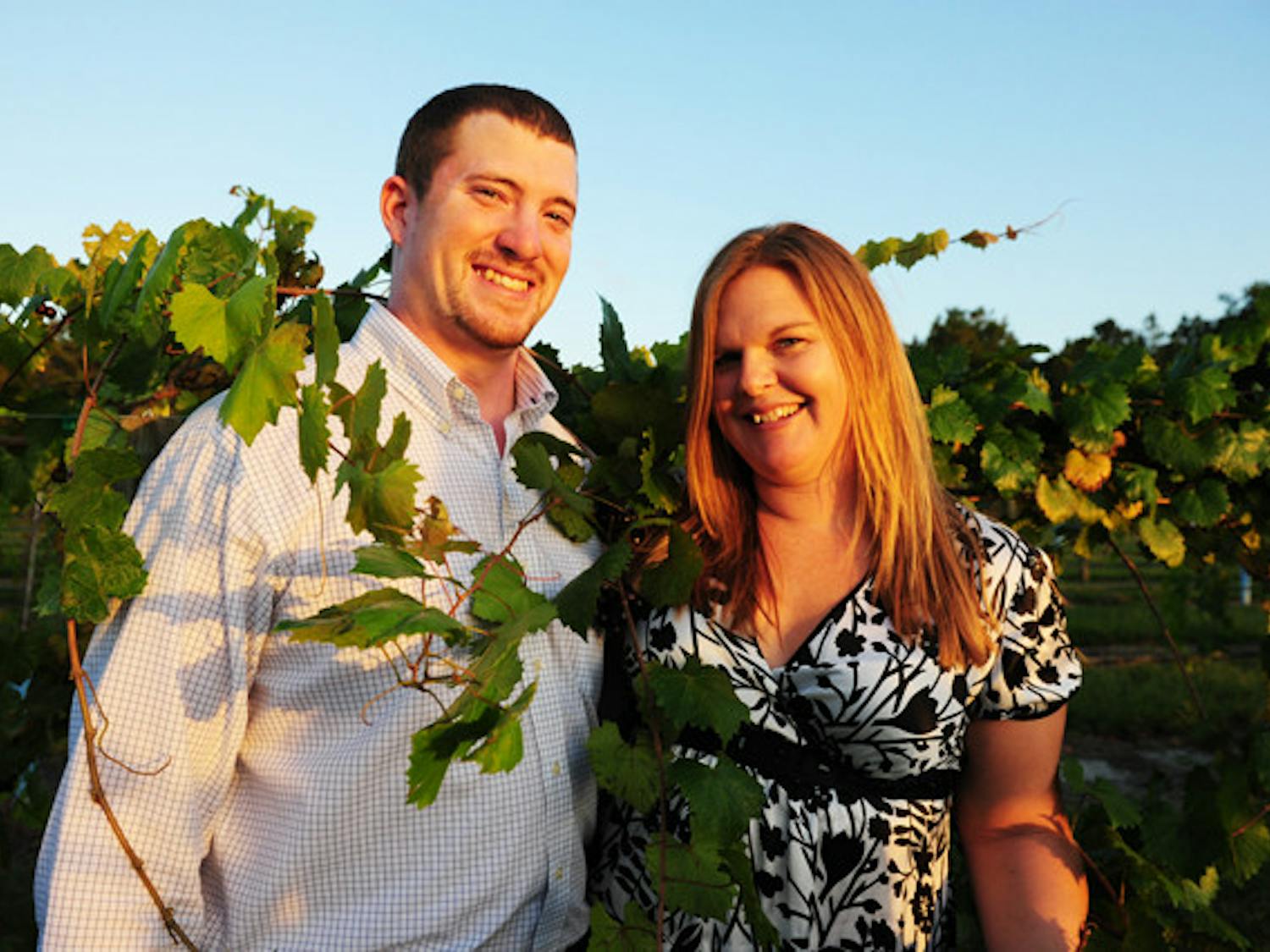 Bradley and Jennifer Ferguson pose in their vineyard, Bluefield Estate Winery, on Wednesday.