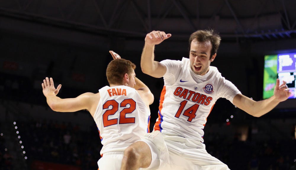 Florida walk-on guards Mak Krause and Andrew Fava celebrate during UF's 108-68 win over North Florida on Nov. 16.