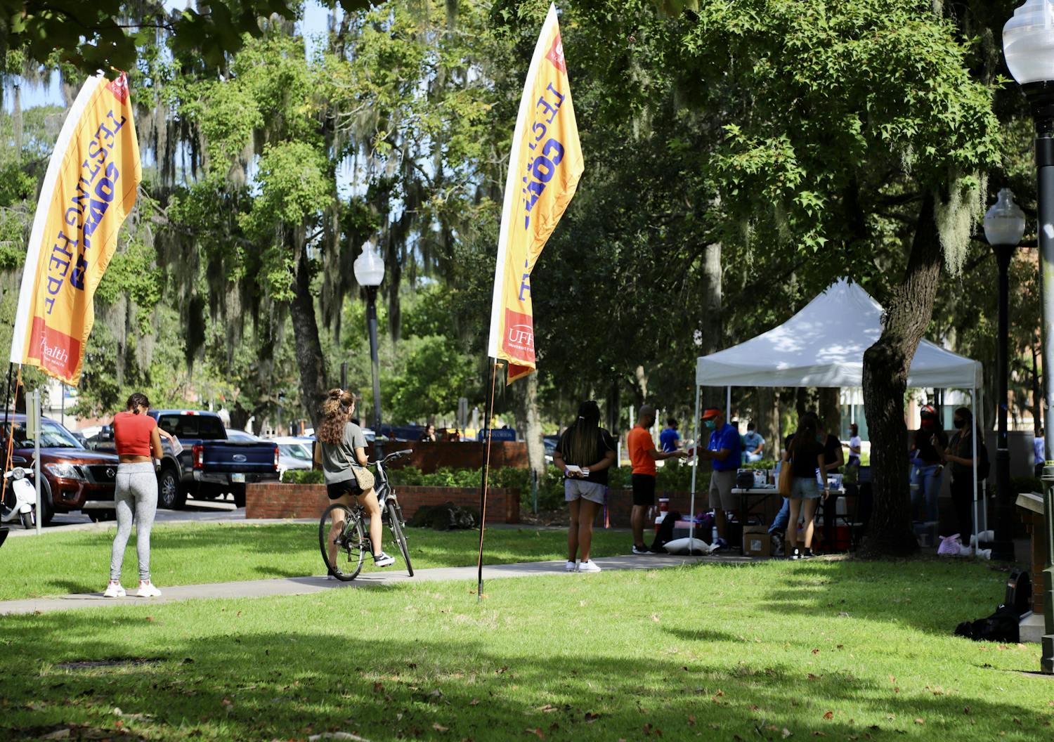 Students are seen waiting in line to be tested at the COVID-19 testing site outside of Murphee Hall on Sept. 24, 2020. Students who wish to get tested are required to fill out an online screening questionnare prior to making an appointment and are asked to bring their Gator One ID card.