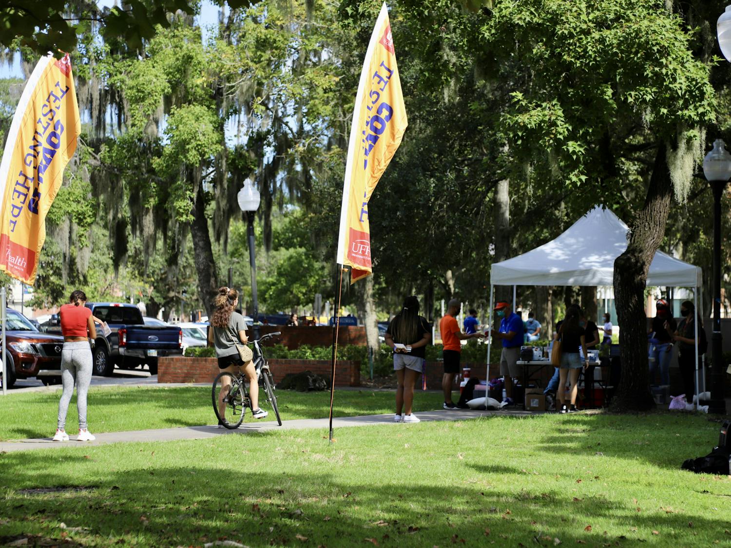 Students are seen waiting in line to be tested at the COVID-19 testing site outside of Murphee Hall on Sept. 24, 2020. Students who wish to get tested are required to fill out an online screening questionnare prior to making an appointment and are asked to bring their Gator One ID card.