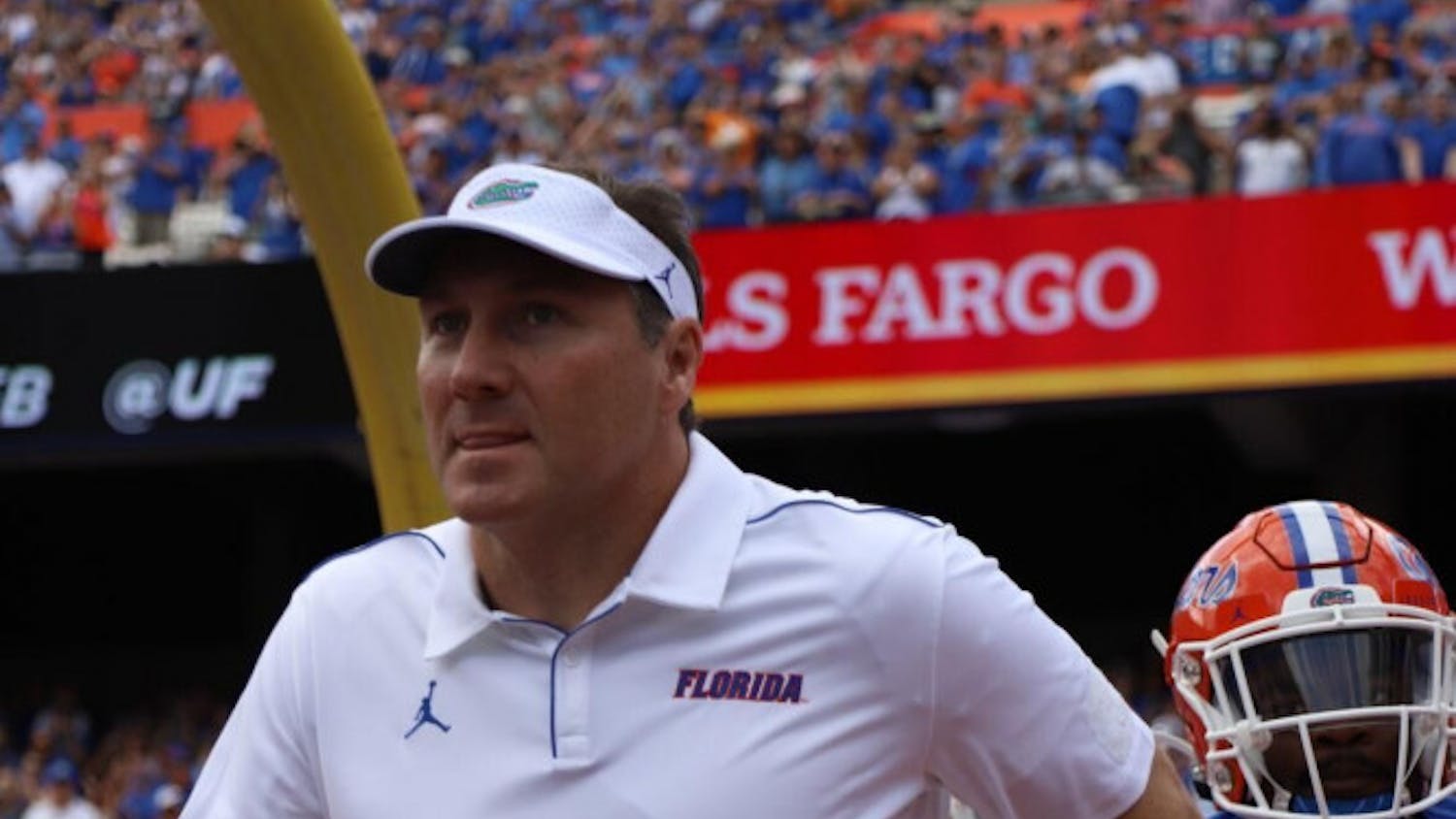 Mullen admitted fault on a recruiting violation and a failure to comply with NCAA investigations.