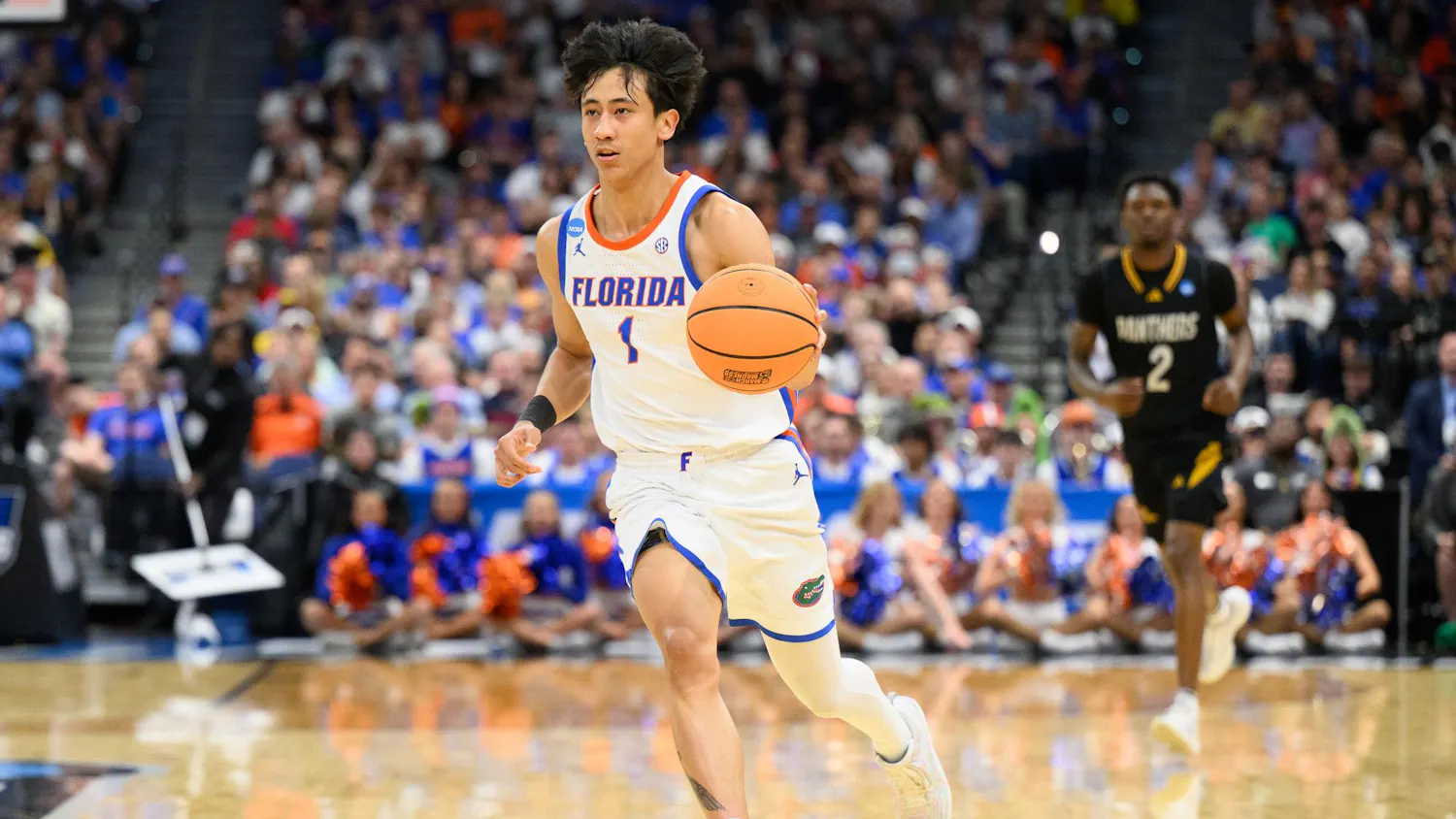 Florida guard Xaivian Lee (1) drives during the first half of an NCAA Tournament first round game against Prairie View A&M, Friday, March 20, 2026, in Tampa, Fla.