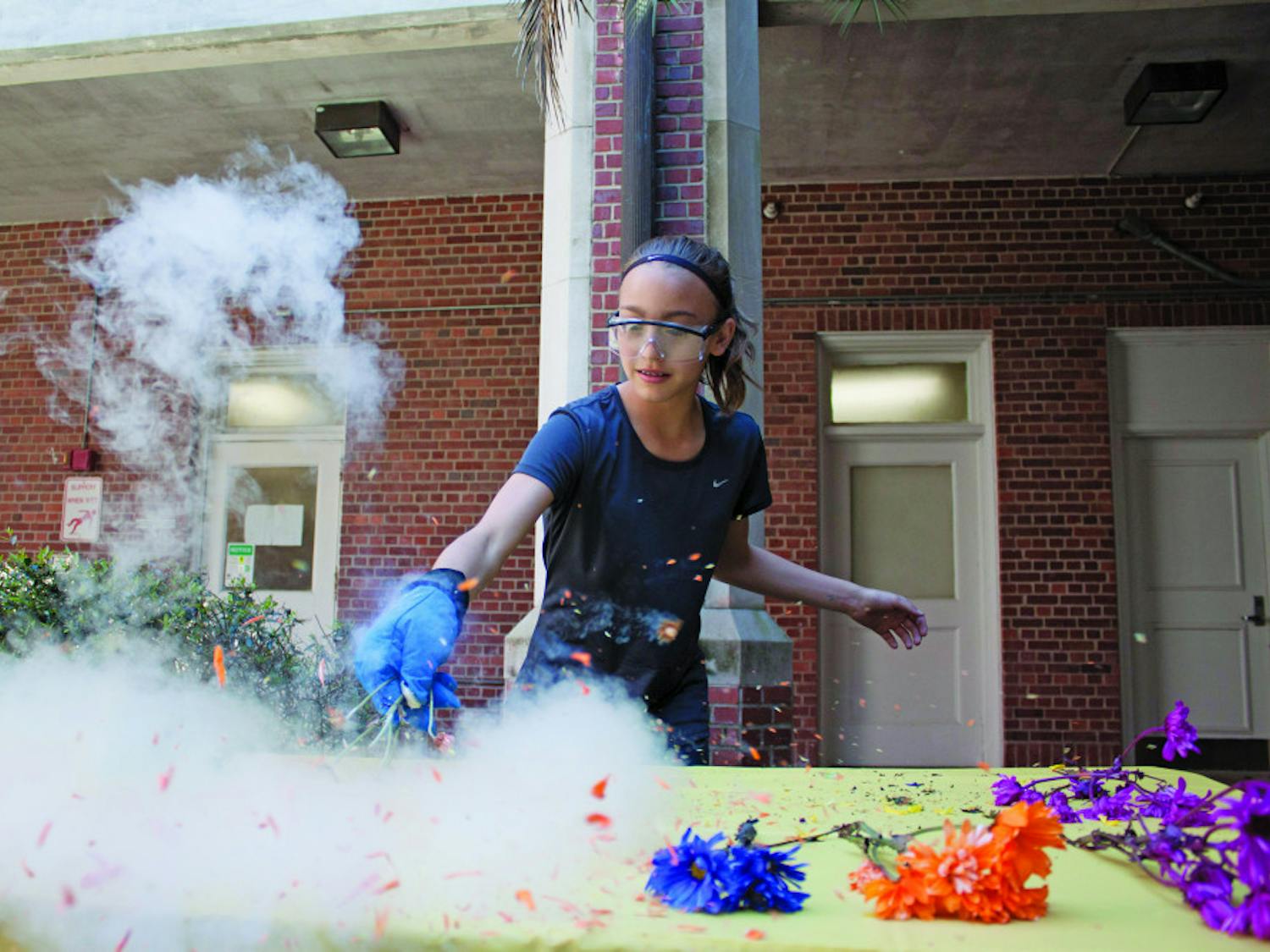 UF’s Women in Science and Engineering (WiSE) holds a science camp for selected sixth- and seventh-grade girls this week, during the Alachua County Schools’ Spring Break. From Monday to Friday of this week, attendees have the opportunity to conduct experiments and learn more about science firsthand, in hopes that they become science advocates in the community. On Tuesday, the attendees of the WiSE Girlz Science Camp conducted a variety of experiments including freezing flowers and making ice cream with liquid nitrogen.