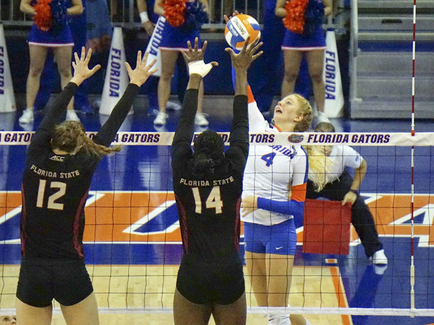 UF outside hitter Carli Snyder swings for a kill attempt during Florida's 3-1 win on Sept. 20, 2015, in the O'Connell Center.