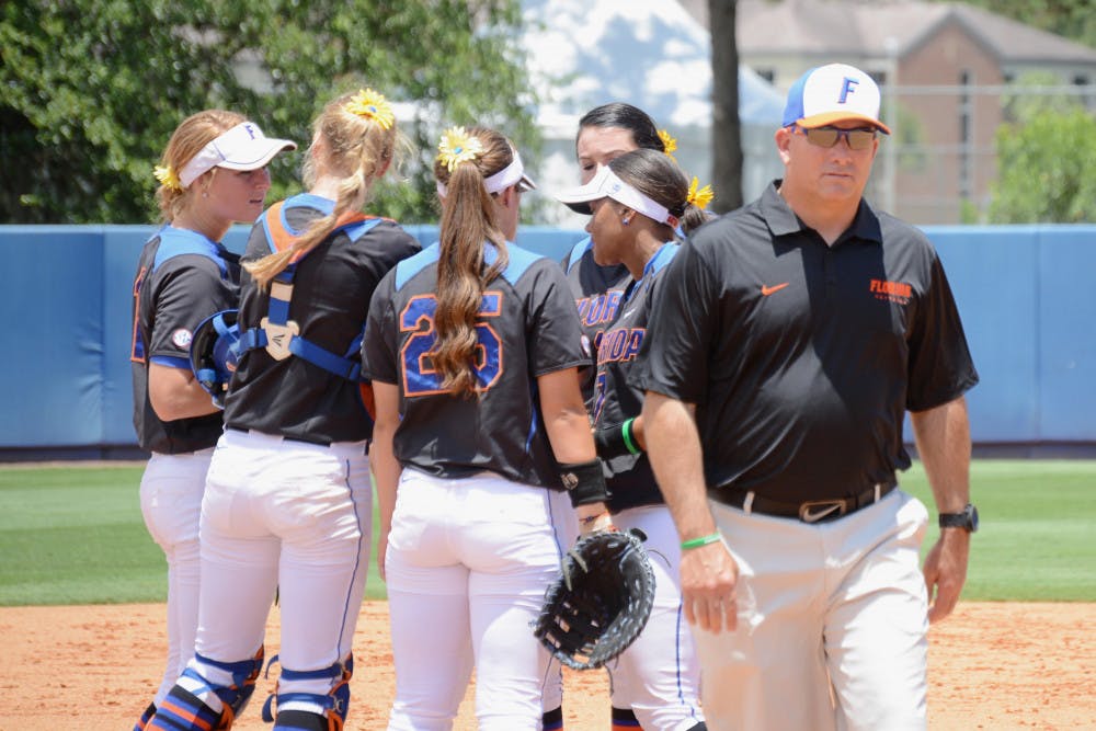 <p>UF coach Tim Walton walks to the dugout during Florida's 1-0 win against Florida Atlantic in the 2015 NCAA Regionals on May 17, 2015, at Katie Seashole Pressly Stadium.</p>