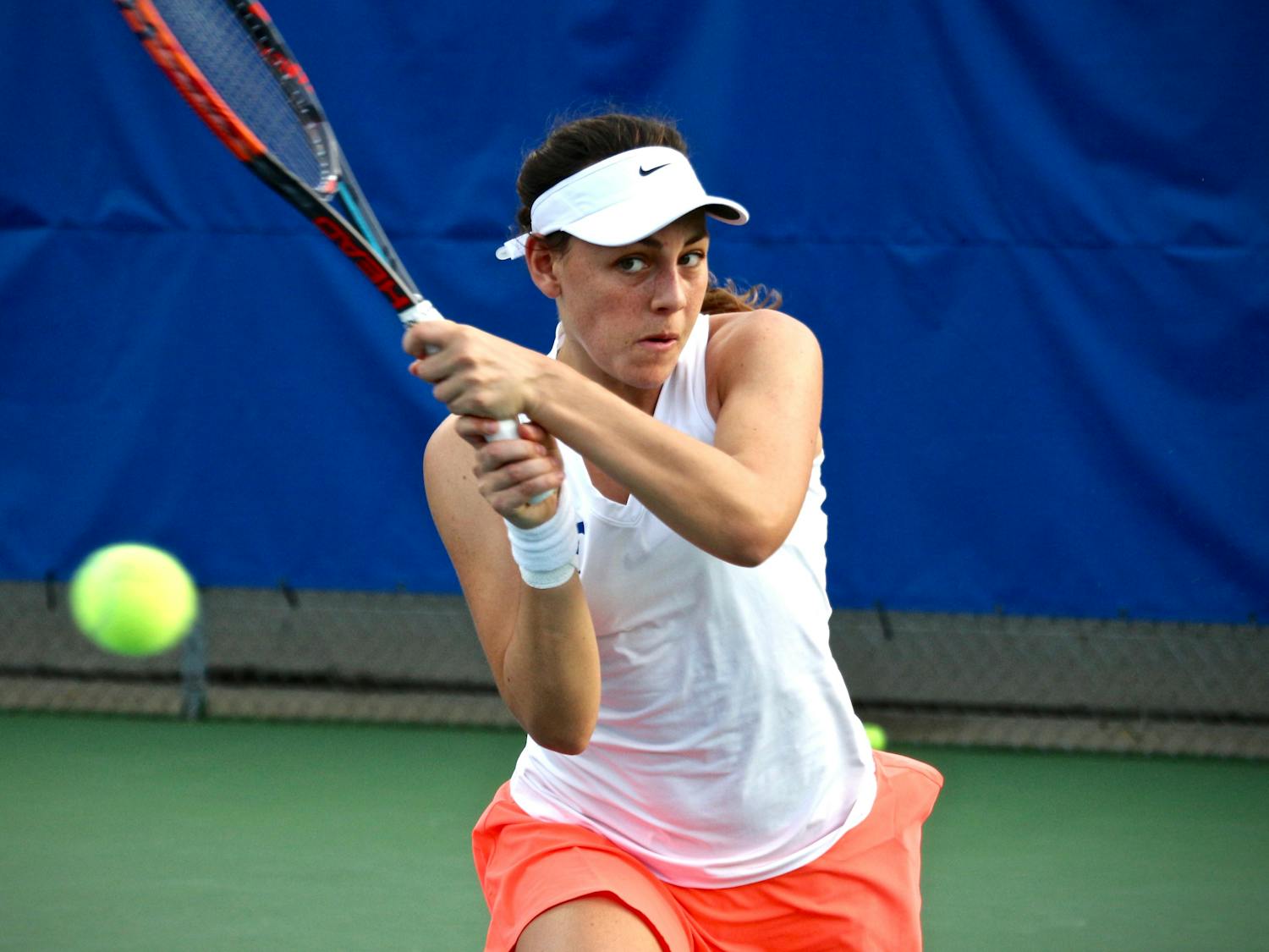 Ingrid Neel returns a ball during Florida's 4-2 win against Oklahoma State on Feb. 18, 2017, at the Ring Tennis Complex.