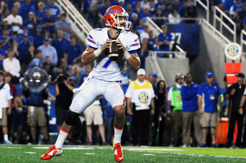 <p>UF quarterback drops back to pass during Florida's 14-9 win against Kentucky on Sept. 19, 2015, at Commonwealth Stadium in Lexington, Kentucky.</p>