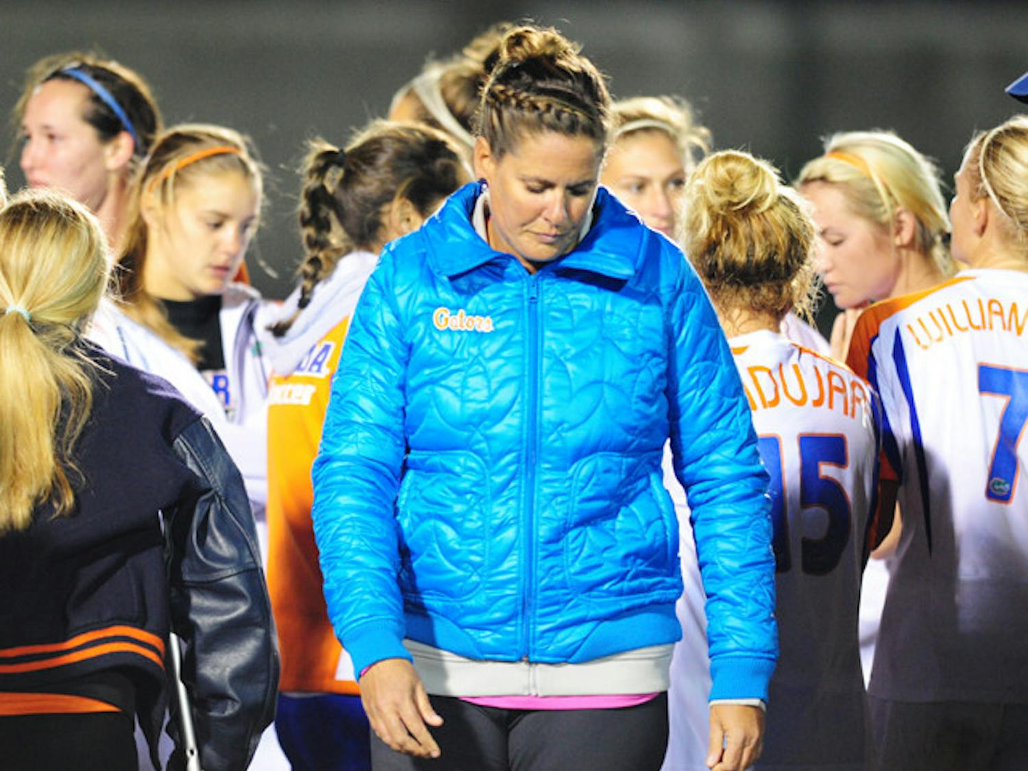 Coach Becky Burleigh walks off the field after losing to UCF 3-2 on Friday. The loss ended the Gators’ season in the second round of the NCAA tournament for the third year in a row.