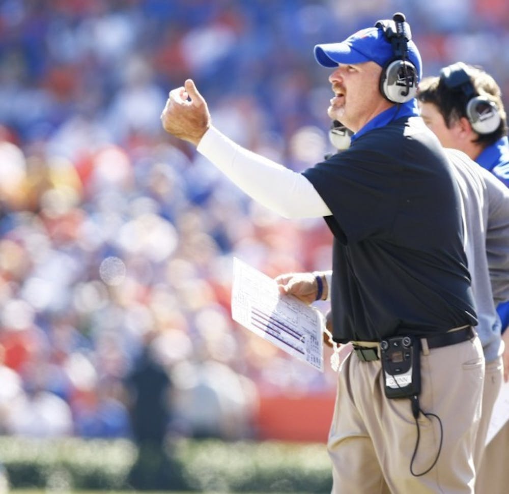 <p><span>Defensive coordinator Dan Quinn shouts to his defensive linemen during Florida’s 14-7 victory against Missouri on Saturday at Ben Hill Griffin Stadium.&nbsp;</span></p>
<div><span><br /></span></div>