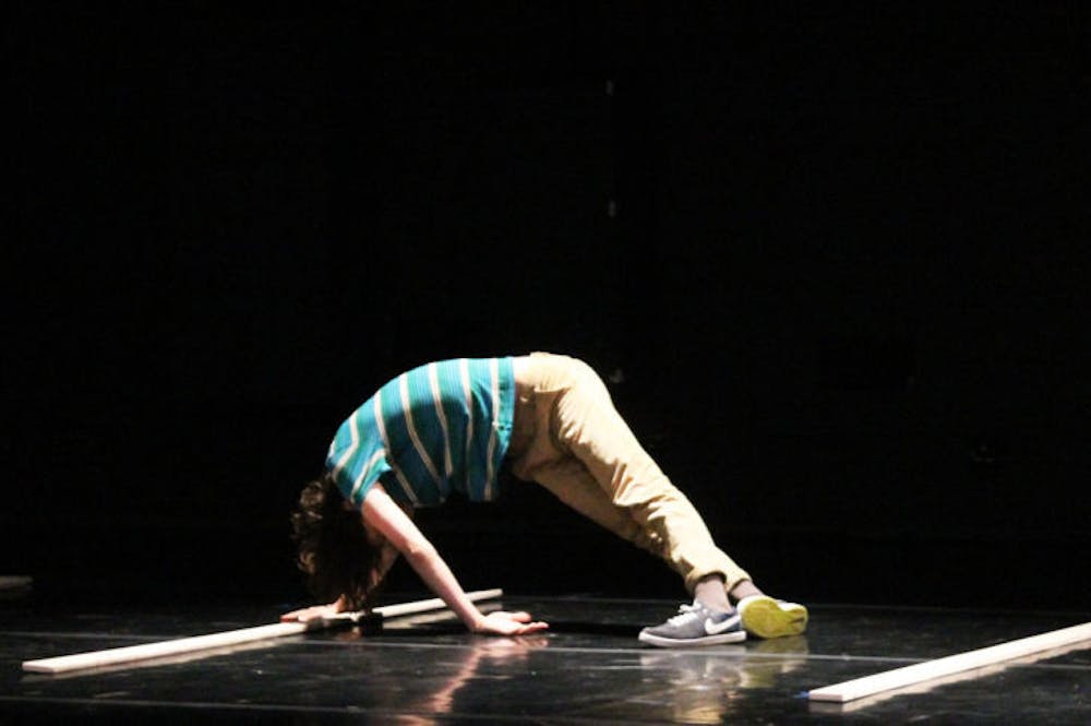 <p>Joey Loto, a 21-year-old dance senior, performs a solo routine. Groups practiced Tuesday in preparation for the Spring BFA dance showcase.</p>