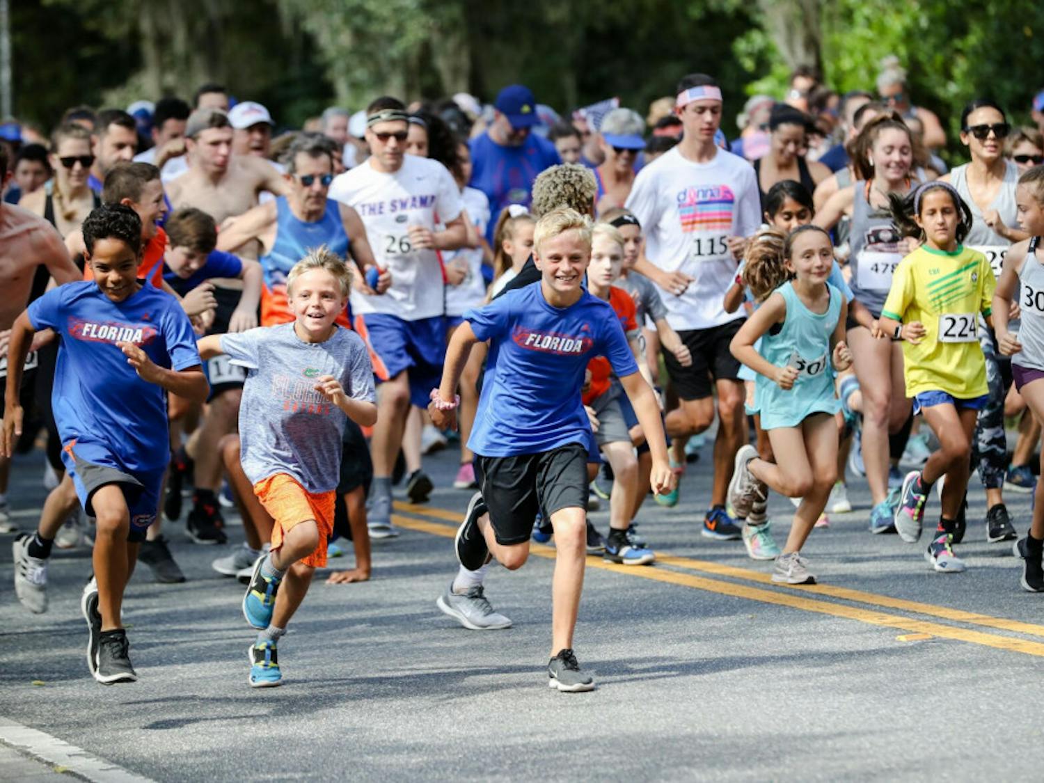 Participants run in the Gator Gallop 5k, one of the various events that takes place during homecoming week at UF in Fall 2019. (Photographer: Adler Garfield, 2019 Director of Photography)