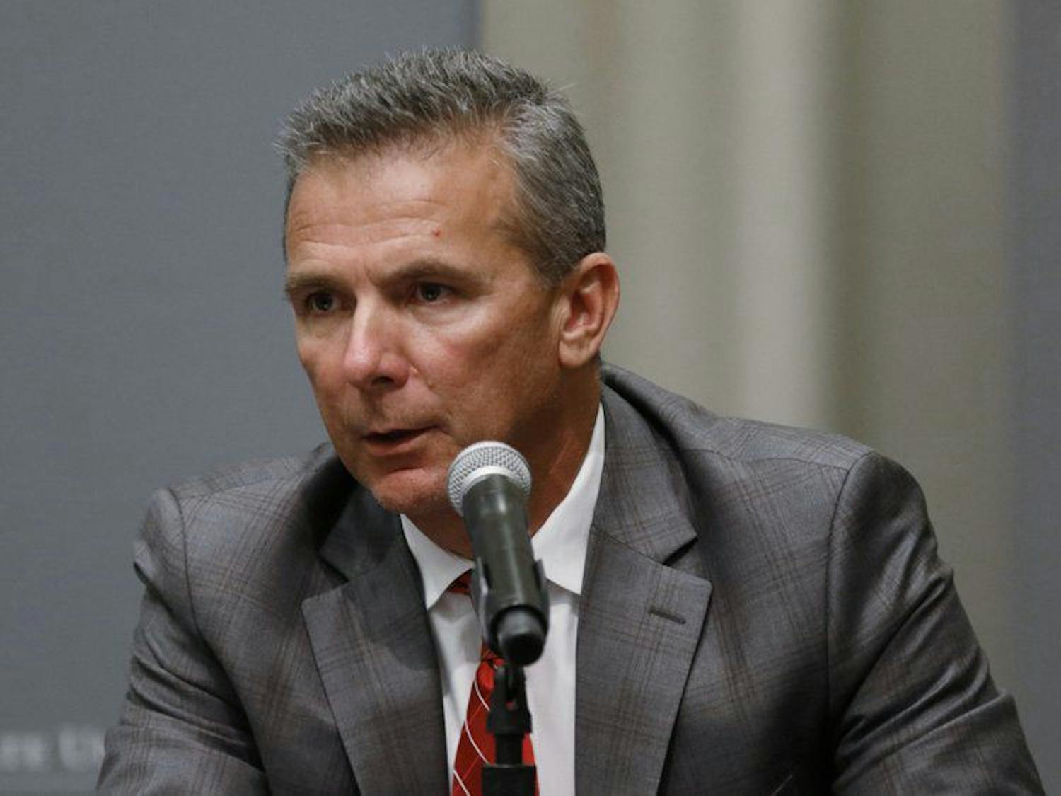 Ohio State coach Urban Meyer was suspended for the team’s first three games for mishandling repeated professional and behavioral problems of assistant coach Zach Smith.