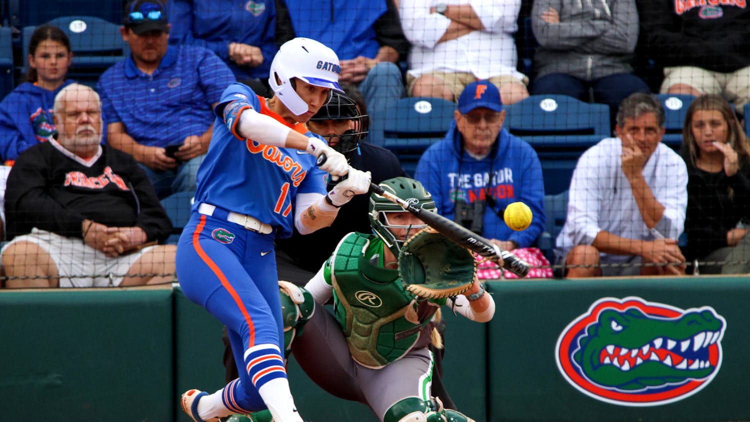 Florida shortstop Skylar Wallace hits a two-run home run in the Gators' 8-0 mercy-rule victory over the Stetson Hatters Wednesday, March 29, 2023.