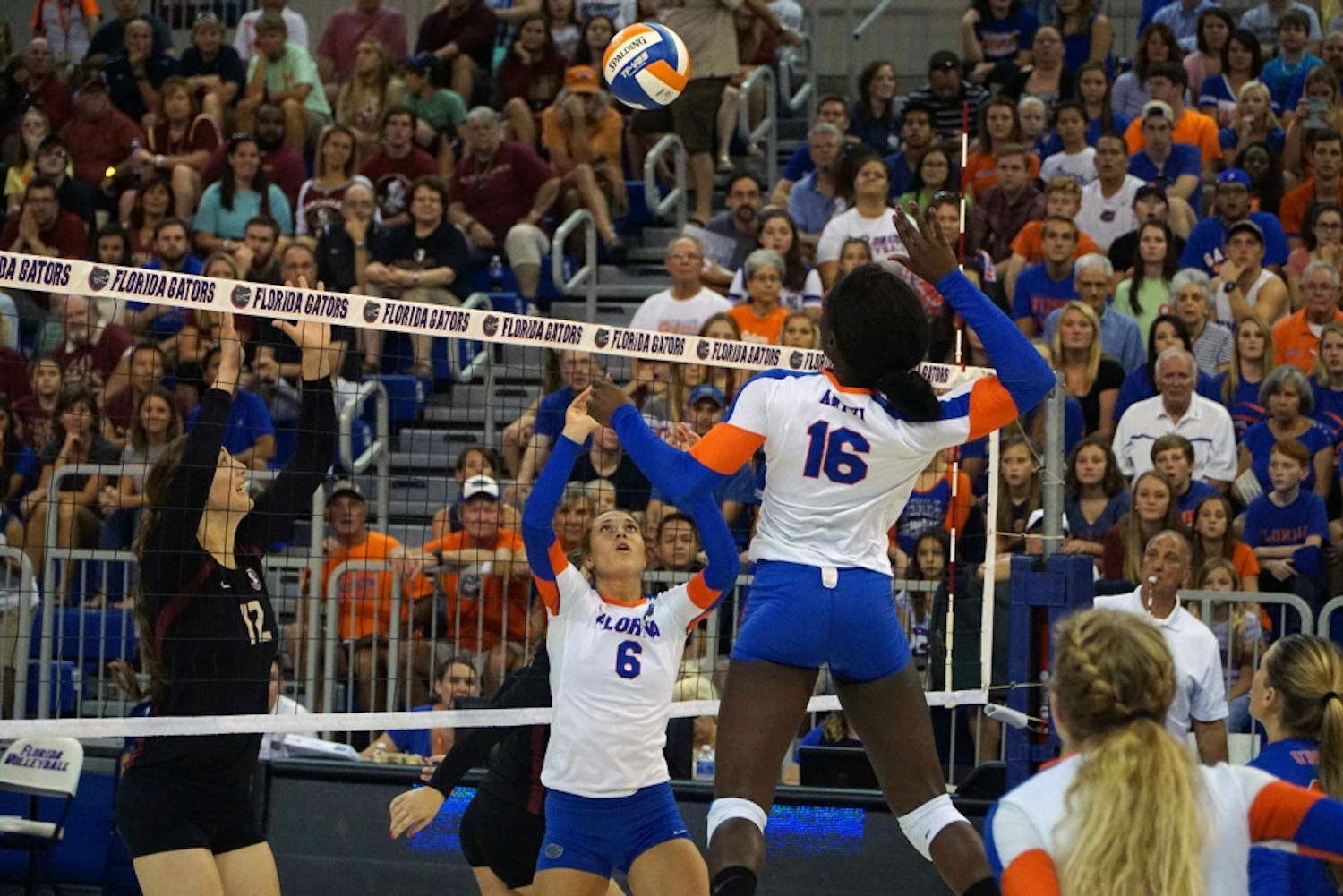 UF setter Mackenzie Dagostino (6) sets the ball for middle blocker Simone Antwi (16) during Florida's 3-1 win on Sept. 20, 2015, in the O'Connell Center.