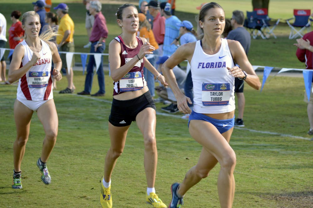 <p class="p1">Taylor Tubbs races in the Southeastern Conference Championships on Nov. 1, 2013, on the Mark Bostick Golf Course.</p>